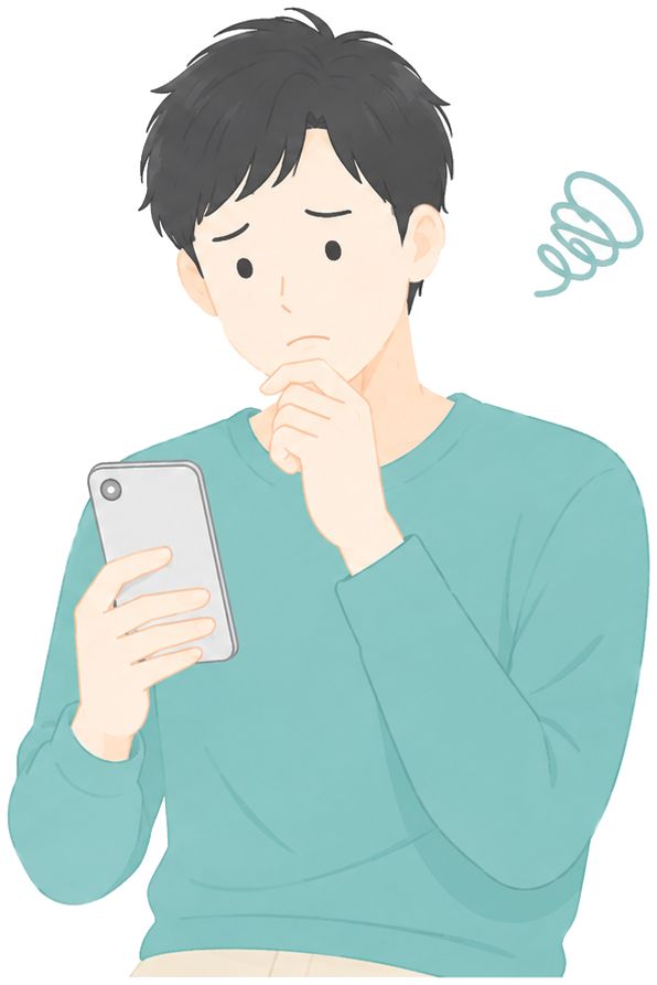 スマホを見て困り顔の男性